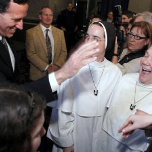 Rick Santorum greets nuns at a Knights of Columbus rally, Feb. 24. Getty Imagesa