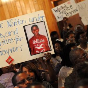 Residents attend to a town hall meeting 2/20 to discuss Martin's slaying. Getty 