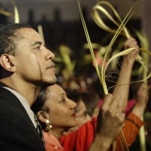 Obama at an April 4, 2004 Palm Sunday mass in Chicago. Via Getty Images.