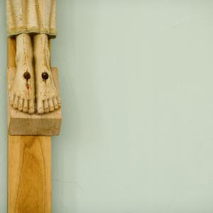 Detail of Christ's feet on the crucifix. Photo by Getty Images. 