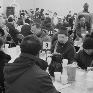 People gather in the Father's Heart Ministries soup kitchen. Image courtesy Fath