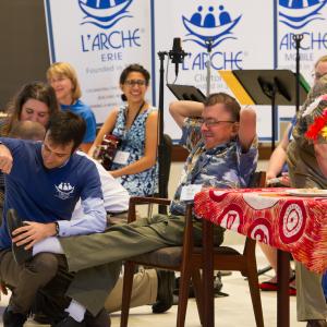 Co-chairs of L'Arche USA's inclusion team dramatize the founding of L'Arche. Ima