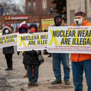 Peace activists rally in suburban Detroit, demanding that the United States sign the Treaty on the Prohibition of Nuclear Weaspons, on Jan. 22, 2021.