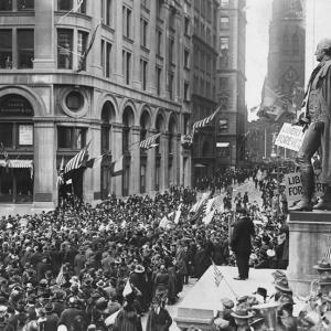 Crowds gather at the Subtreasury building on Wall Street for Armistice Day 1918