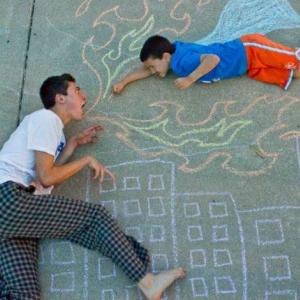 The chalk drawing by Wes Noyes, 17, with his superhero brother, Jonah, 8. 