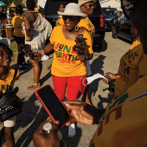 Joyful Black people of all ages gather outdoors in Juneteenth Celebrate! t-shirts