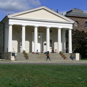 An photo of students walking past Miller Chapel on Princeton Seminary's campus