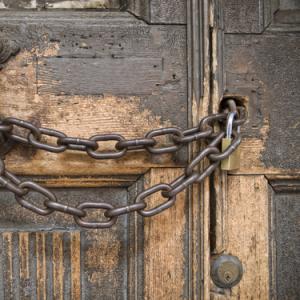 Locked church doors. Photo courtesy vesilvio/shutterstock.com