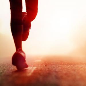 Silhouette of runner, Warren Goldswain / Shutterstock.com