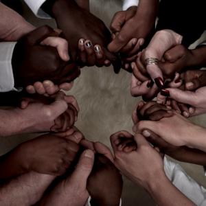 Hands held in a circle. Photo courtesy Brett Jorgensen/shutterstock.com