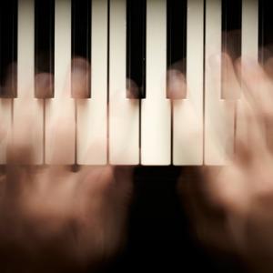 Photo: Hands playing piano, © silver-john / Shutterstock.com