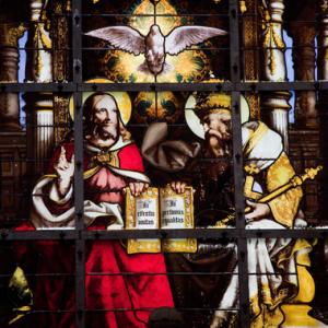 Stained glass window depicting the Holy Trinity, jorisvo / Shutterstock.com