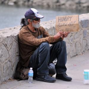 Homeless man photo, JustASC / Shutterstock.com