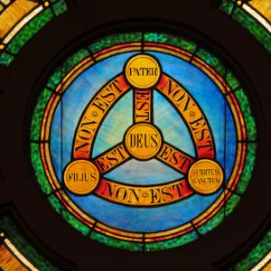 Stained glass illustration of the Holy Trinity, Nancy Bauer / Shutterstock.com