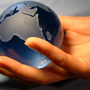 Globe in hand,  Magdalena Bujak / Shutterstock.com