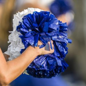 Cheerleaders at the side of the field. Image courtesy CLS Design/shutterstock.co