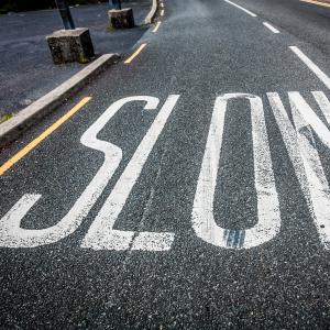 Slow down sign, Semmick Photo / Shutterstock.com