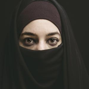 Woman wearing a burqa. Photo via Shutterstock / RNS