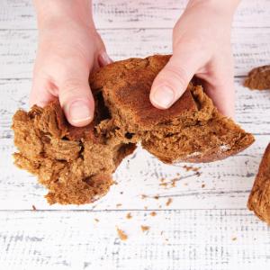 Breaking bread. Image via Africa Studio/shutterstock.com