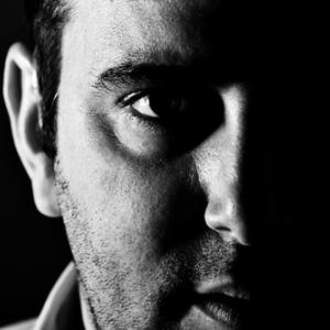 Close-up of intimidating man, JPagetRFPhotos / Shutterstock.com