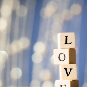 Blocks spelling 'love.' Gita Kulinitch Studio / Shutterstock.com