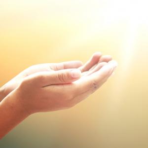 Hands in gratitude. Image courtesy CHOATphotographer/shutterstock.com