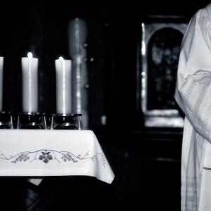 Priest during Mass, Gordan / Shutterstock.com