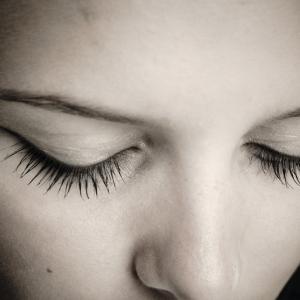 Woman praying, Smirnof/Shutterstock.com