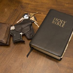 Keys, a Bible, and a gun. Image courtesy Jorge R. Gonzalez/shutterstock.com.