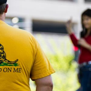 Man carries his sidearm to support the permitless carry law going into effect on July 1.