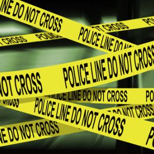 Police crime scene tape,  Luis Louro /Shutterstock.com