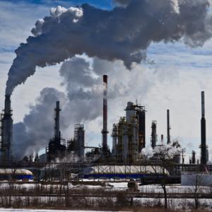 Oil refinery emissions, David Sprott / Shutterstock.com