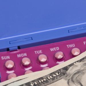 Birth control pills with payment, Brooke Becker / Shutterstock.com