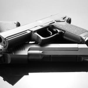 Handgun photo, Nomad_Soul / Shutterstock.com
