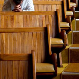 Praying image via Shutterstock