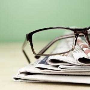 Stack of newspapers photo, kret87 / Shutterstock.com