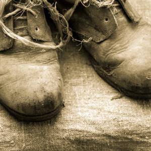Worn out shoes, spot-h / Shutterstock.com