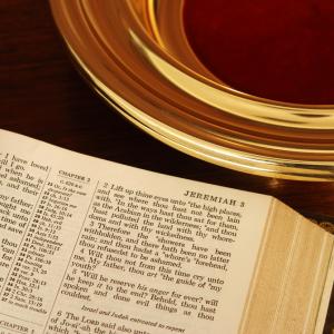 Collection plate and bible, Wellford Tiller, Shutterstock.com