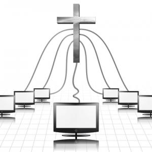 A cross plugged into computer screens. Illustration courtesy Bruce Rolff/shutter