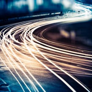 Light trails from fast-moving cars, ssguy / Shutterstock.com