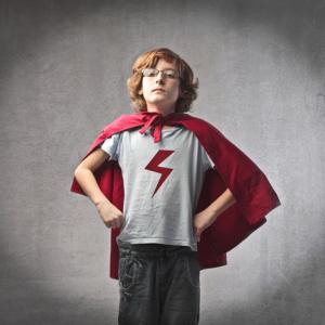 Child in superhero suit, olly / Shutterstock.com