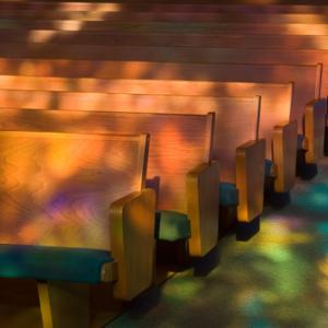 Empty church pews. Photo by Tony Marinella Photography/ Shutterstock.com.