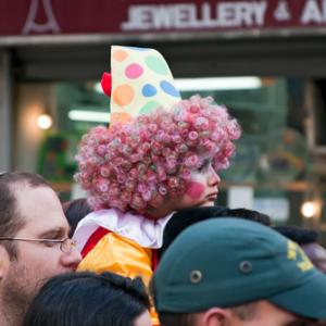 Purim carnival in Jerusalem. Unidentified people watch the show. (Ekaterina Lin 