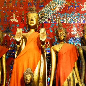 Buddha statues in Wat Xieng, MJ Prototype / Shutterstock.com