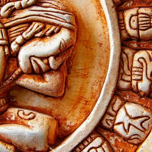 Close-up of the glyphs on the Mayan calendar.