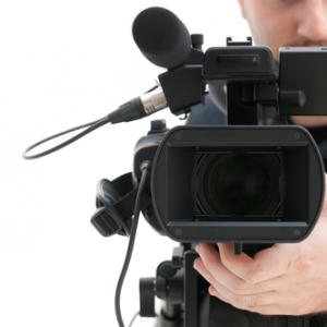 Video camera operator, © Rido/ Shutterstock.com