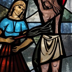 Stained glass window of Jesus scourging, Nancy Bauer / Shutterstock.com
