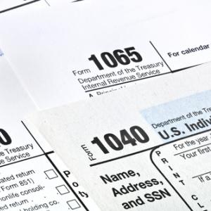 Photo: Tax forms,  © Garry L. / Shutterstock.com