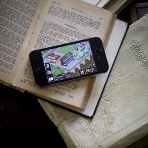 Are cell phones used in worship as tools of listening or of distraction? Photo b