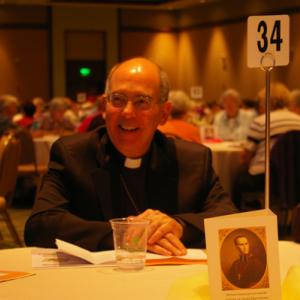 Seattle Archbishop J. Peter Sartain, LCWR’s apostolic delegate, is seen at the g